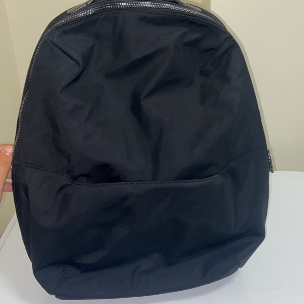 Away Travel Backpack in Black with Luggage Sleeve